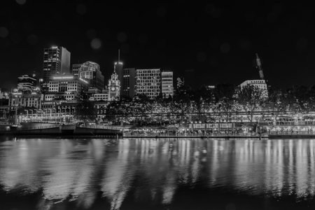 Melbourne Australia - March 9 2020; City at night, buildings, lights and corporate brands neon signs...