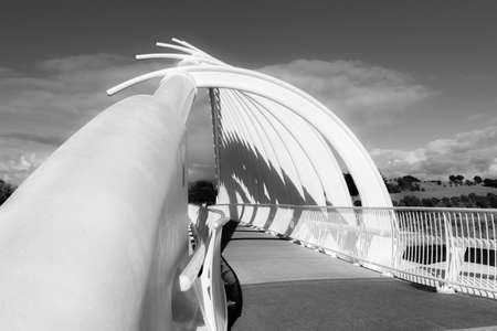 New Plymouth New Zealand - TJuly 27 2014; Te Rewa Rewa Bridge with architectural structure across Waiwhakaiho River in Taranaki.のeditorial素材