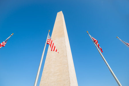 Washington Monument tall obelisk in National Mall Washington DC commemorating George Washington with...