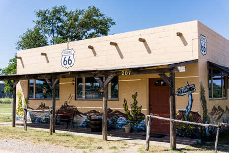 Shamrock, USA - September 11 2015; Building along famous Route 66 Spanish theme with welcome sign on wall.のeditorial素材