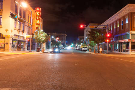 Albuquerque, New Mexico, USA _ September 18 2015;  Night on street outside  KiMo Theatre, a Pueblo Deco picture palace, was opened on September 19, 1927 long exposure light trails and urban illumination.のeditorial素材