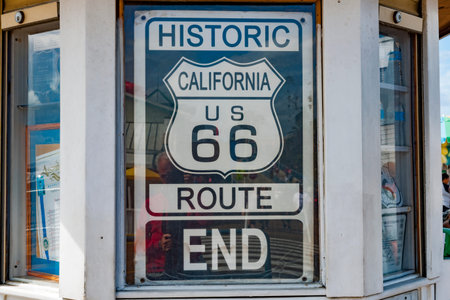 Los Angeles USA -October 5 2015; Famous window sign marking western end of Route 66 on Santa Monica...