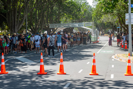 Tauranga New Zealand - February 7 2021; Concert attendees arrive and line up at the entry for the...