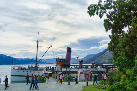 Queenstown New Zealand - March 2 2015; Tourists arrive at Walter Peak Station famous historic high country sheep station on tourのeditorial素材