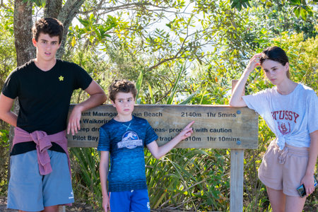 Mount Maunganui New Zealand - December 15 2020; Three disinterested and unimpressed at having to go on long walk to summit.のeditorial素材