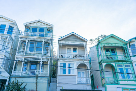 Wellington New Zealand - July 31 2021; Tinakori Road heritage examples of an Edwardian villa design on row with gables high above street below.のeditorial素材