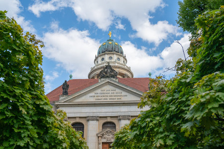 Berlin Germany - August 26 2017; Rear view of French Cathedral on Gendarmenmarkt in Berlin with religious inscription in German translates to " god in honor of the community as a blessing under the protection of the hohenzollern built in 1705 again in 19のeditorial素材
