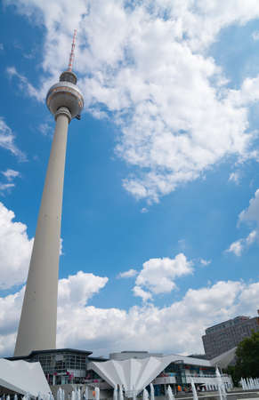 Berlin Germany - August 27 2017; TV tower 368m-tall landmark tower, opened in 1969 contains a revolving restaurant and viewing platform and towers above the city urban landscape.のeditorial素材