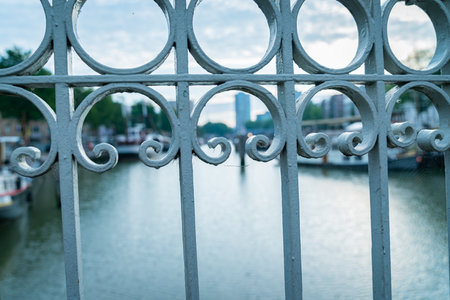 Wrought iron protective railing along bridge side over Old Harbour in city of Rotterdam, Netherlands.の写真素材