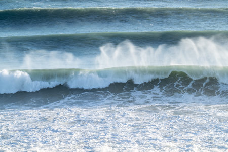 Cyclone Cody large waves and swells rolling in in sequence at Mount Maunganui