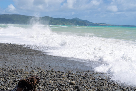 Huge seas crashing on stony beach at Te Arararoa, on New Zealand's East coast.