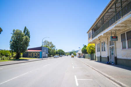 Ruatoria New Zealand - February 4 2022; Street through township of Ruatoria with side of building signed emotionally with word "HOPE".のeditorial素材