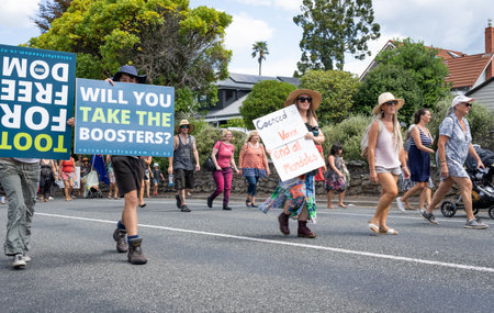 Tauranga New Zealand - February 26 2022; Local people taking part in covid pandemic anti-mandate protect march.のeditorial素材