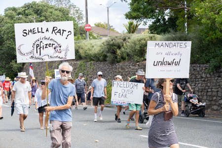 Tauranga New Zealand - February 26 2022; Local people taking part in covid pandemic anti-mandate protect march.のeditorial素材