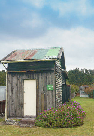 Okarito New Zealand - April 29 2022; Rustic tiny home or hut accommodation in remote small South Island coastal townshipのeditorial素材