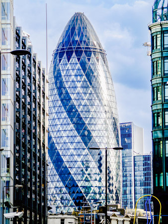 Street scene in London city 30 St Mary Axe famous and landmark known as gherkin buildingの写真素材