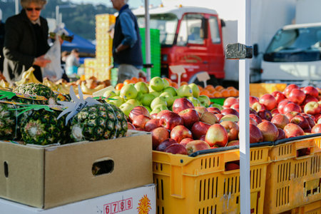 Wellington New Zealand - October 4 2010; Focus on apples for sale at Saturday morning farmers market in cityの写真素材
