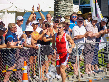 Tauranga New Zealand - January 8 2011;Editorial-Spectators line street waiting for athletes in Port Of Tauranga Half Marathonのeditorial素材