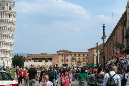 Pisa Italy - April 24 2011; Tourists in street near Leaning Tower and Duomoのeditorial素材
