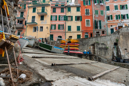 Riomaggiore Italy - April 23 2011; Boat-ramp at waters edge in colourful traditional hillside coastal fishing village in Cinque Terreのeditorial素材