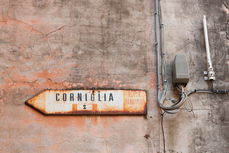 Vernazza Italy - April 26 2011; Street direction sign pointing to coastal Cinque Terre village Cornigliaのeditorial素材