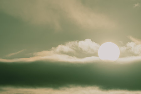 Sun over cloud in dramatic sky.の写真素材