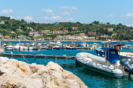 Portovenere Italy - April 27 2011; Rocky waterfront in bay at Portovenere.のeditorial素材