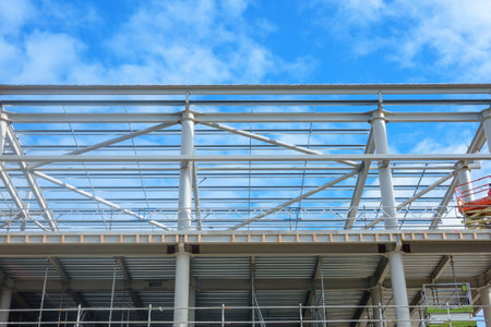 Construction in steel commercial building framing and structural beams and uprights.