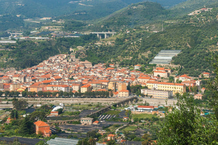 Typical Italian valley village of San Remo, Italy from autostrada.の写真素材