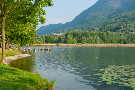 View of jetty in small mountain Lake Piano, Italy.の写真素材