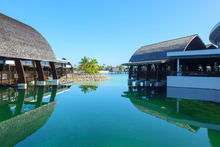 Momi Bay Fiji - September 15 2023; E-foiling in the lagoon, tutor shows how doing it easy, relaxing e-foil style.のeditorial素材