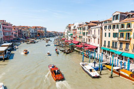 Venice Italy - May 10 2011;  Views of people and boating activity on Grand Canal from Rialto Bridge.のeditorial素材
