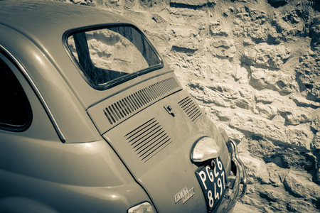 Gubbio Italy - May 13 2011; Vintage image effect of back end of classic olf small Italian car.のeditorial素材