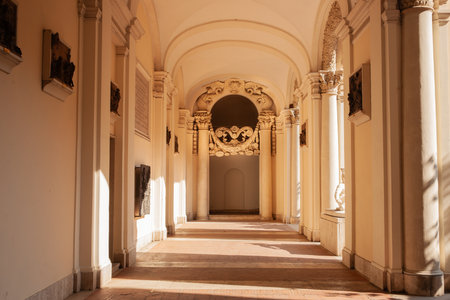 Rome  Italy - May 20 2011; Passageway to ornate entrance  with sunlight and shadows across hallのeditorial素材