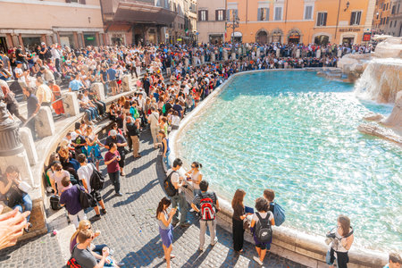 Rome Italy May 21 2011; Crowds of tourists gather around perimeter of Trevi Fountain.のeditorial素材