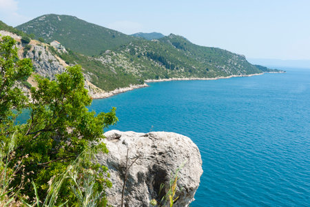 Coastal view across Mediterranean sea from scenic land in Croatiaの写真素材