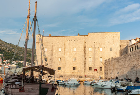 Dubrovnik Croatia - May 28 2011; Boats moored in marina on outside of ancient city wallのeditorial素材