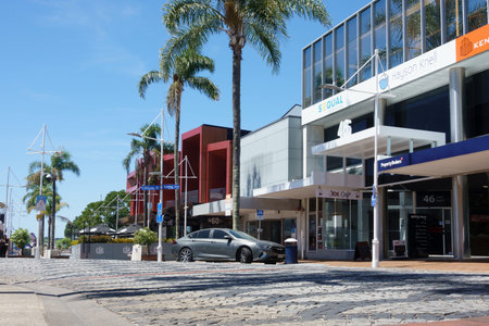Tauranga New Zealand - February 12 2024; Editorial-Street scene in Tauranga business district with cobbled street and palm trees in Spring Street.のeditorial素材