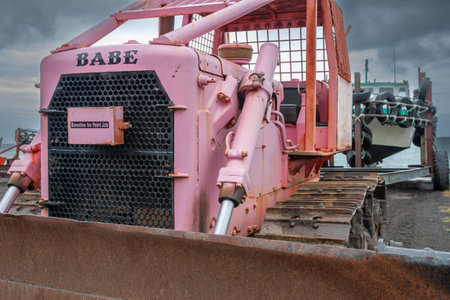 Ngawi New Zealand - November 29 2011; editorial-Old tractors used to tow boast to and from seaのeditorial素材