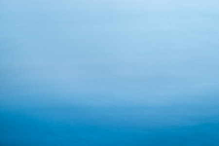 Blue blurry abstract, a cobalt blue bottle abstract that is blurred for a textured color background.の写真素材