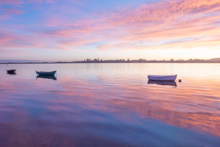 Impressionist sunrise over Waimapu estuary of Tauranga Harbour.の写真素材