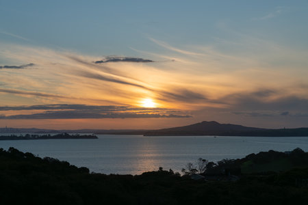 Sunset view from Waiheke Island to Rangitoto Island, Auckland New Zealand.の写真素材