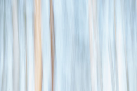 Long exposure blur effect background in blue and green tones and vertical pattern.の写真素材