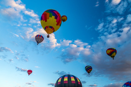 Hot Air Balloons fly over the city of Albuquerque, New Mexicoの写真素材
