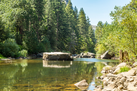 The Merced River in Yosemite Valley as it flows from the Sierra Nevada to the San Joaquin Valley.の写真素材