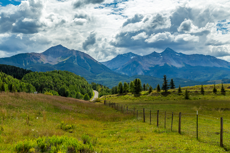 The San Juan Skyway forms a 233 mile loop in southwest Colorado traversing the heart of the San Juan Mountains festuring breathtaking mountain views and includes the portion of US 550 between Silverton and Ouray known as the Million Dollar Highway.の写真素材