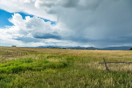A thunder storm approaches from the mountains along US Highway 160 in Colorado.の写真素材
