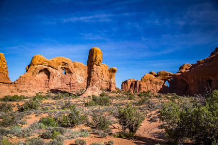 Located outside of Moab, Utah is Arches National Park consisting of 18 miles of scenic drives through the high desert.の写真素材