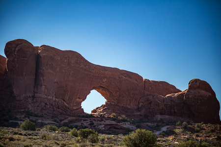 Located outside of Moab, Utah is Arches National Park consisting of 18 miles of scenic drives through the high desert.の写真素材