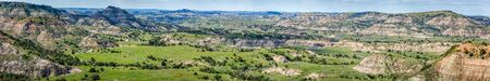 A panoramic view from the Painted Canyon Overlook in the South Unit of Theodore Roosevelt National Park near Medora, North Dakota.の写真素材